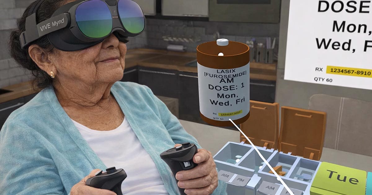 An older woman wearing a VIVE Mynd VR headset and holding controllers interacts with a virtual pillbox.